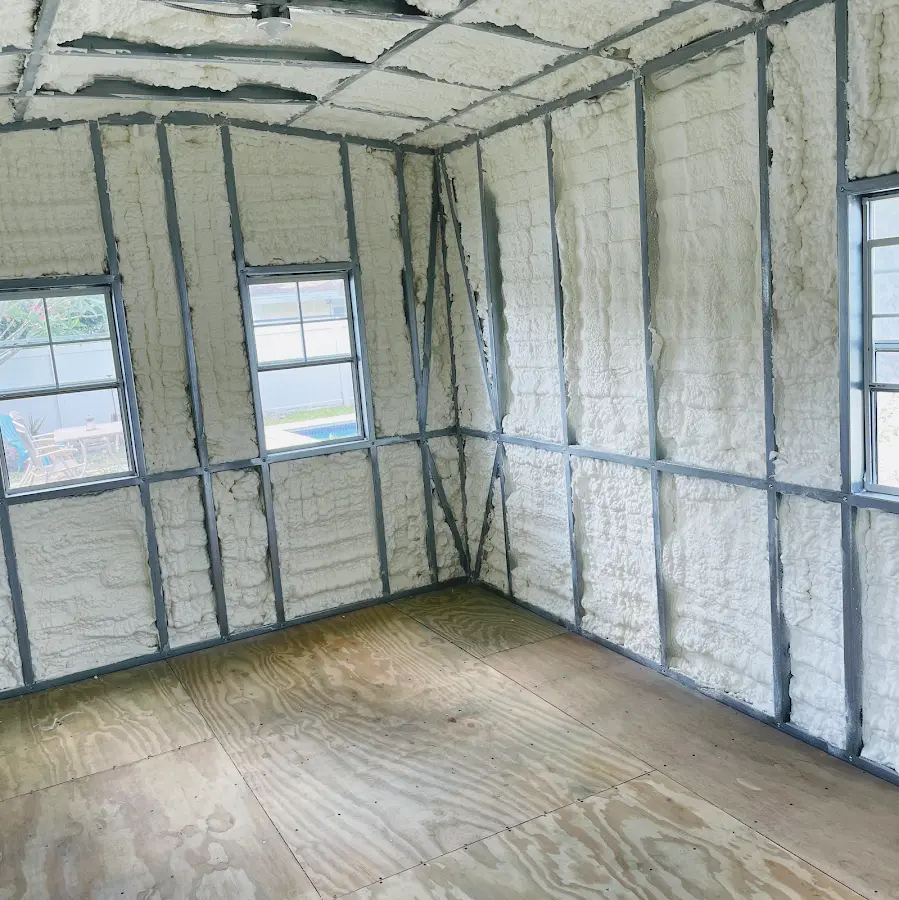 Closed-cell spray foam insulation applied to wall cavities in a residential project in Salem